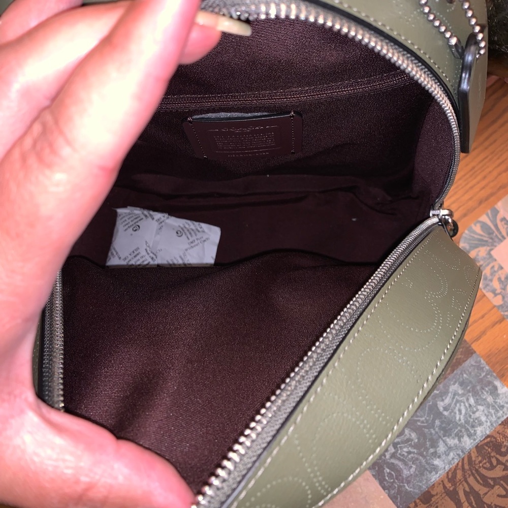 NWT olive green coach backpack with matching wristlet. Backpack is 11”x10”x4”. - Picture 2 of 10